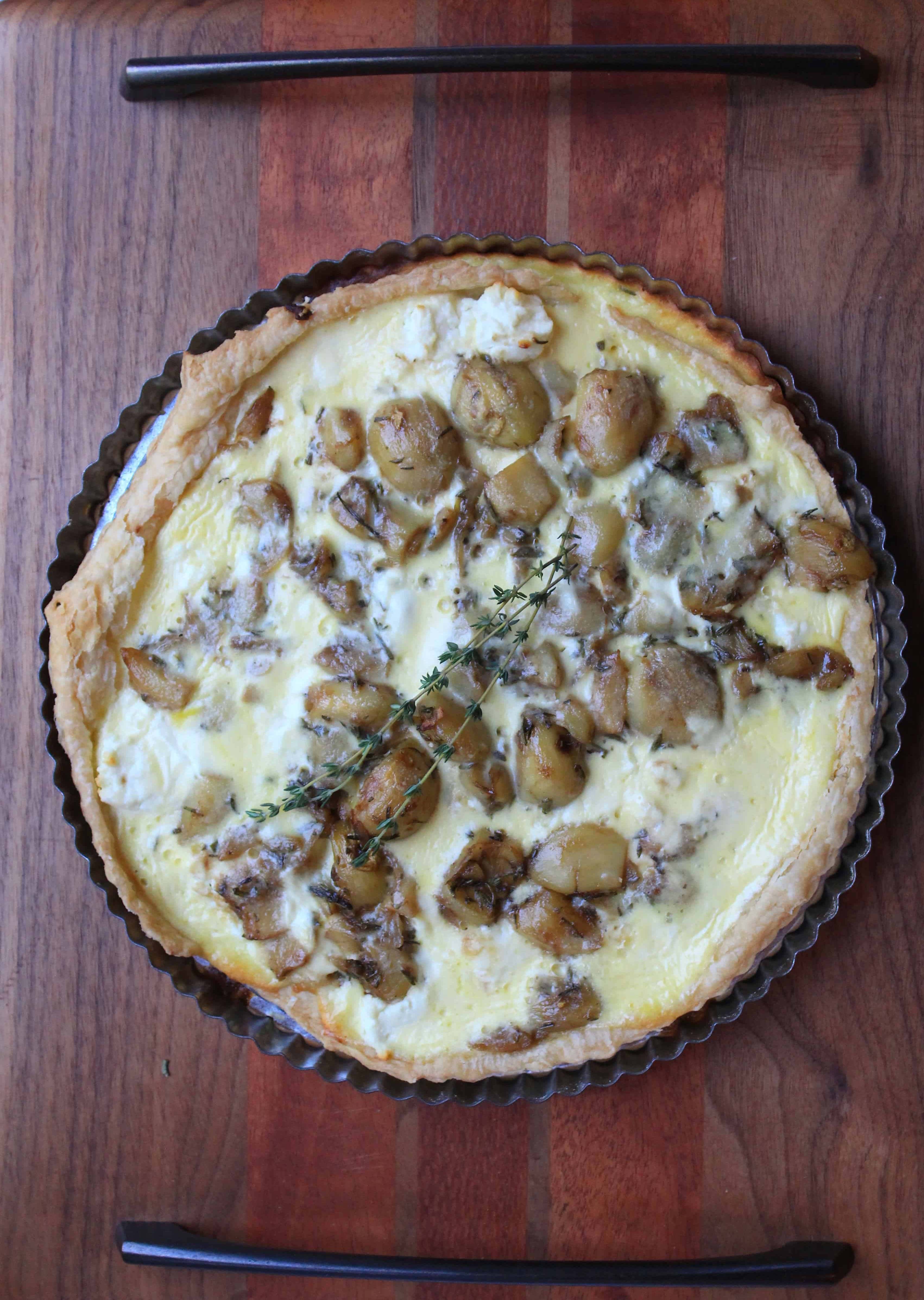 This Caramelized Garlic Tart is absolutely heavenly! The garlic is caramelized with rosemary, thyme, and balsamic, leaving it herbaceously sweet. Two different types of goat cheese mean extra flavor.