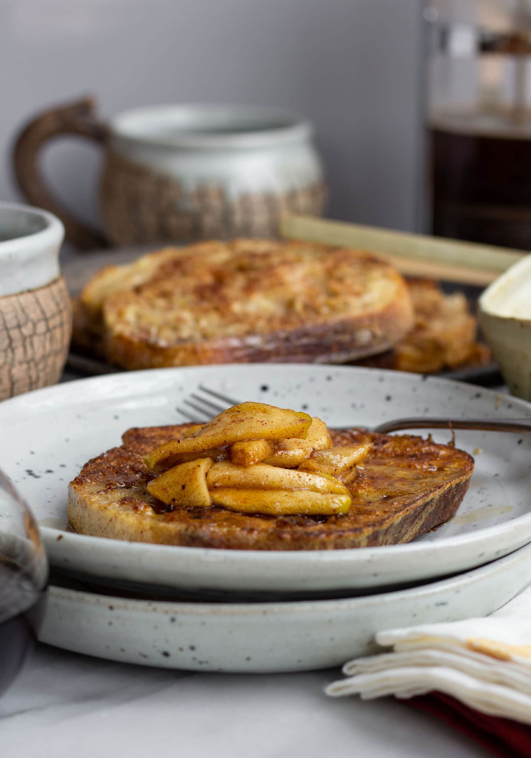 This Sourdough French Toast with Roasted Spiced Apples is the coziest brunch recipe.