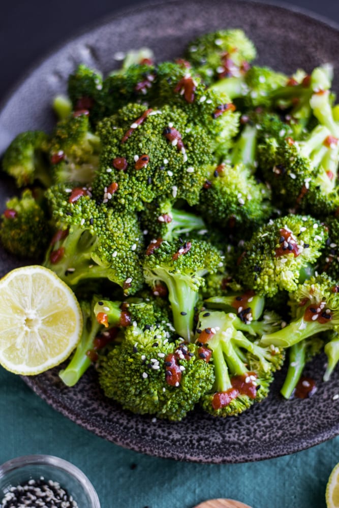 This Spicy Steamed Broccoli is simple and so delicious. A few secret ingredients go in the steaming liquid, offering major flavor!
