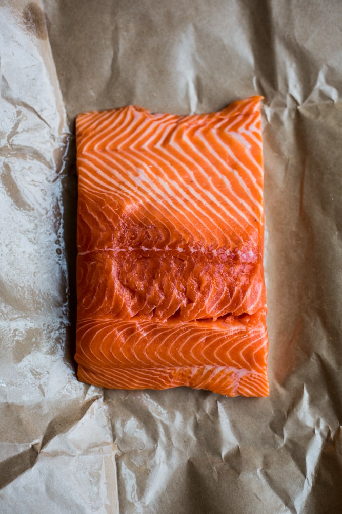 A filet of Ōra King salmon on butcher paper