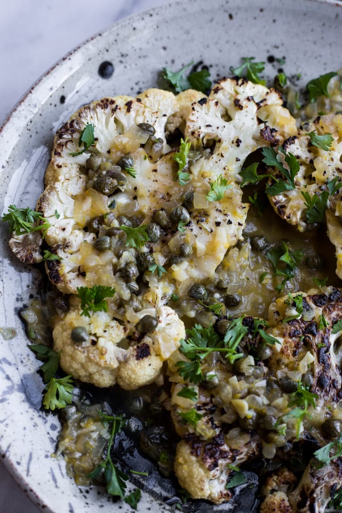 Grilled cauliflower steak with lemon and caper sauce
