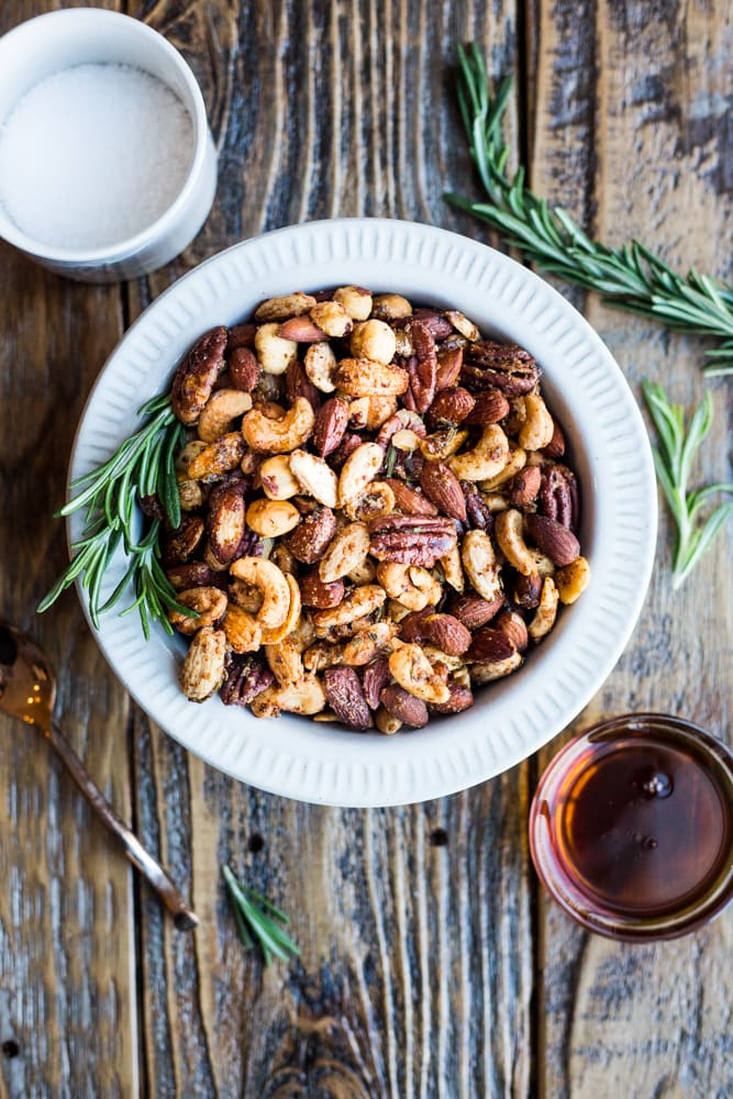 A bowl of rosemary maple roasted nuts