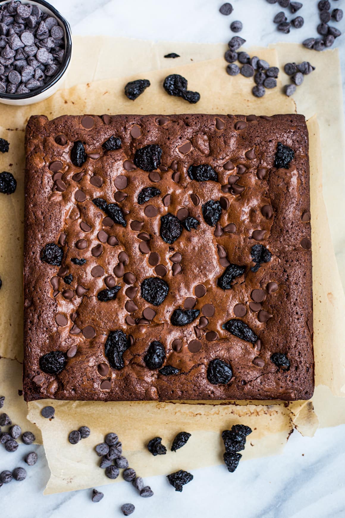 Parchment topped with black forrest brownies