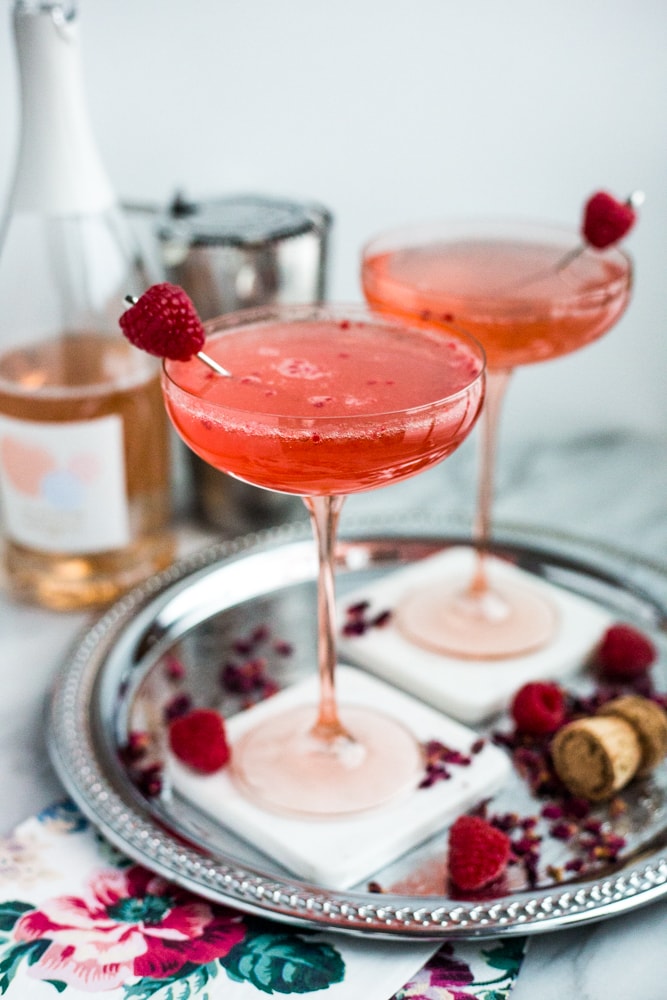Two coupe classes filled with a raspberry rose spritz