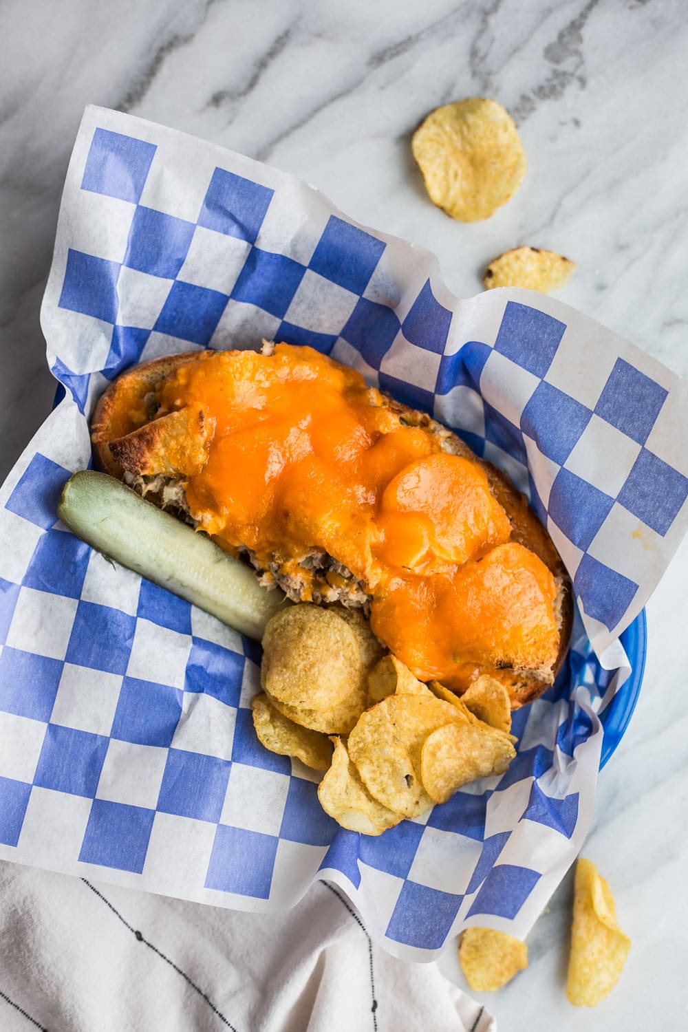 Classic tuna melt recipe on sourdough with melted cheese